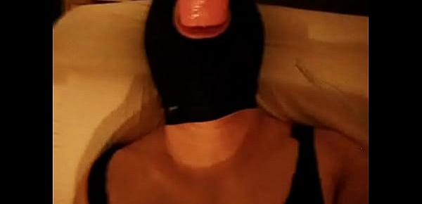  MaskMasked Asian sissy-boy transvestite sucking on dildo cock while jacking off